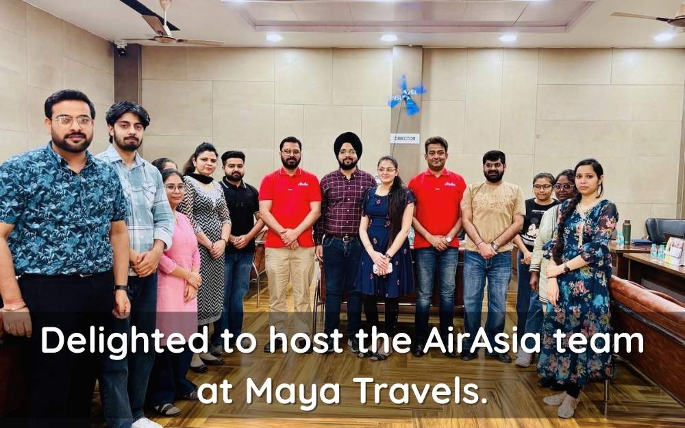 AirAsia team visiting Maya Travels office to strengthen airline travel partnerships